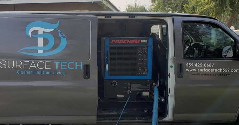 SurfaceTech Cleaning branded service van with professional ProChem extraction equipment in Fresno, CA